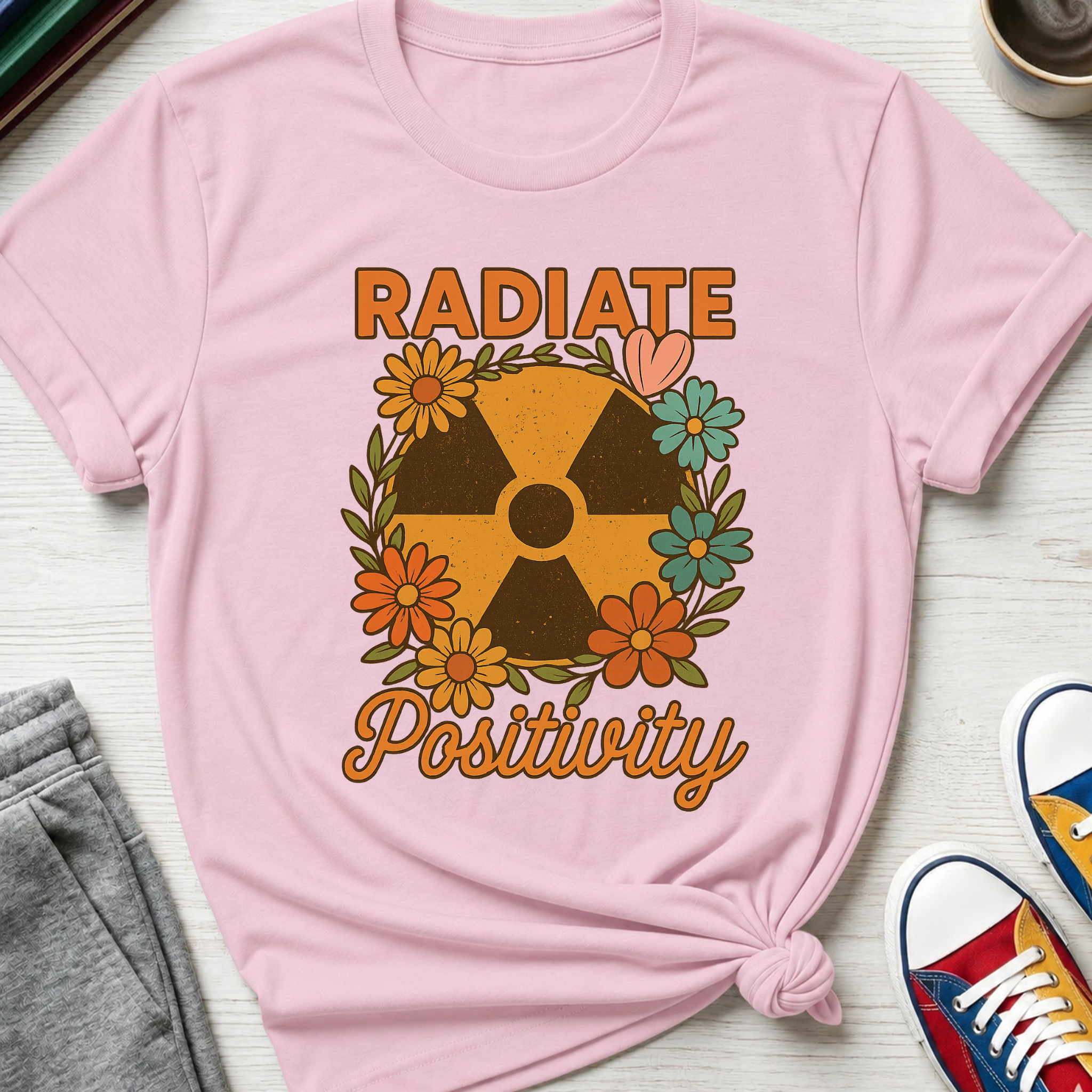 Radiate Positivity Radiation Symbol with Daisies | T-Shirt
